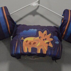 US coast guard approved flotation device. Dark blue with a lion figure on front